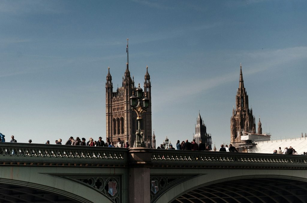 Architectural photography shot of a stone bridge and towers in the background