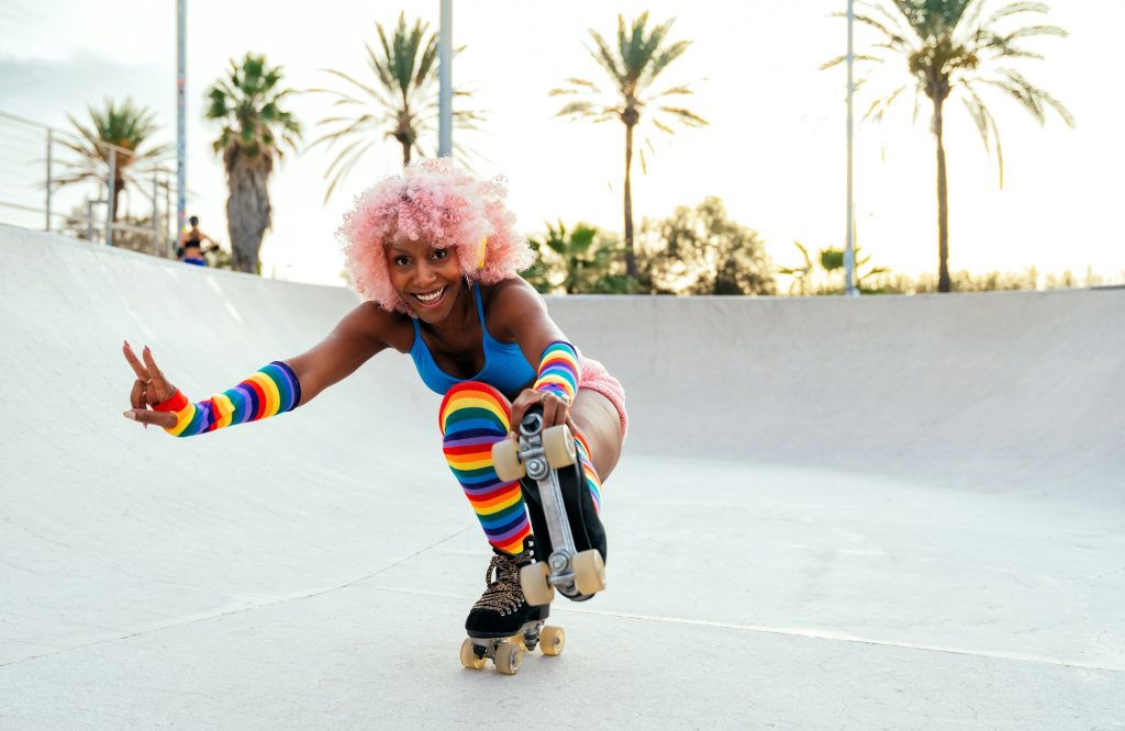 Beautiful woman skating with roller skates and having fun.