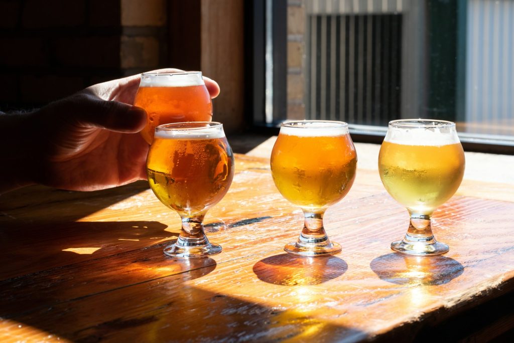 Beer glasses on a table in natural light