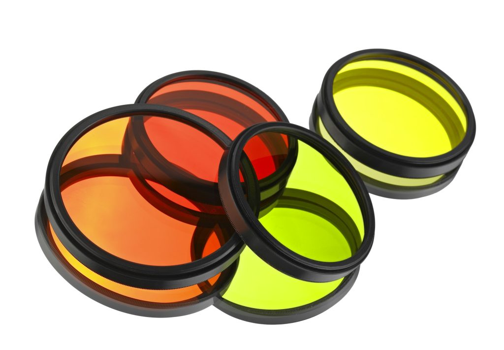 Color filters for lenses over white