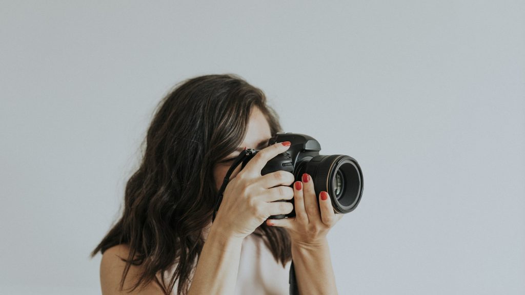 Female photographer at a shoot