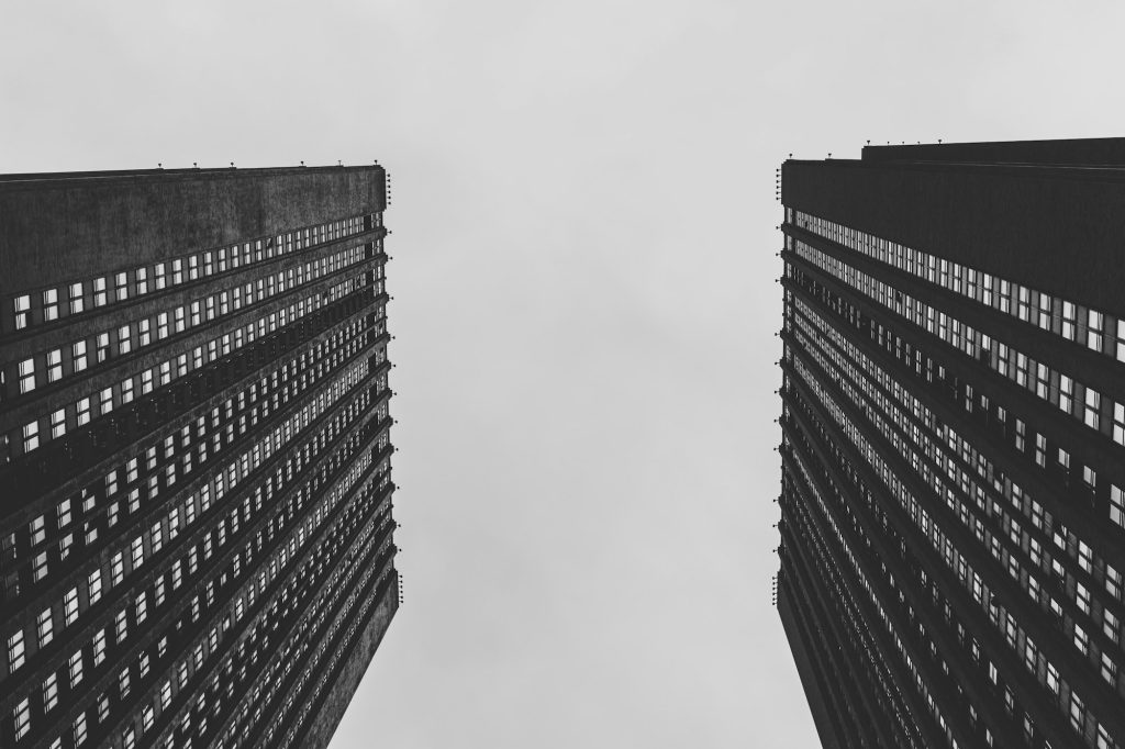 Low angle view of skyscrapers. Black and white photography.