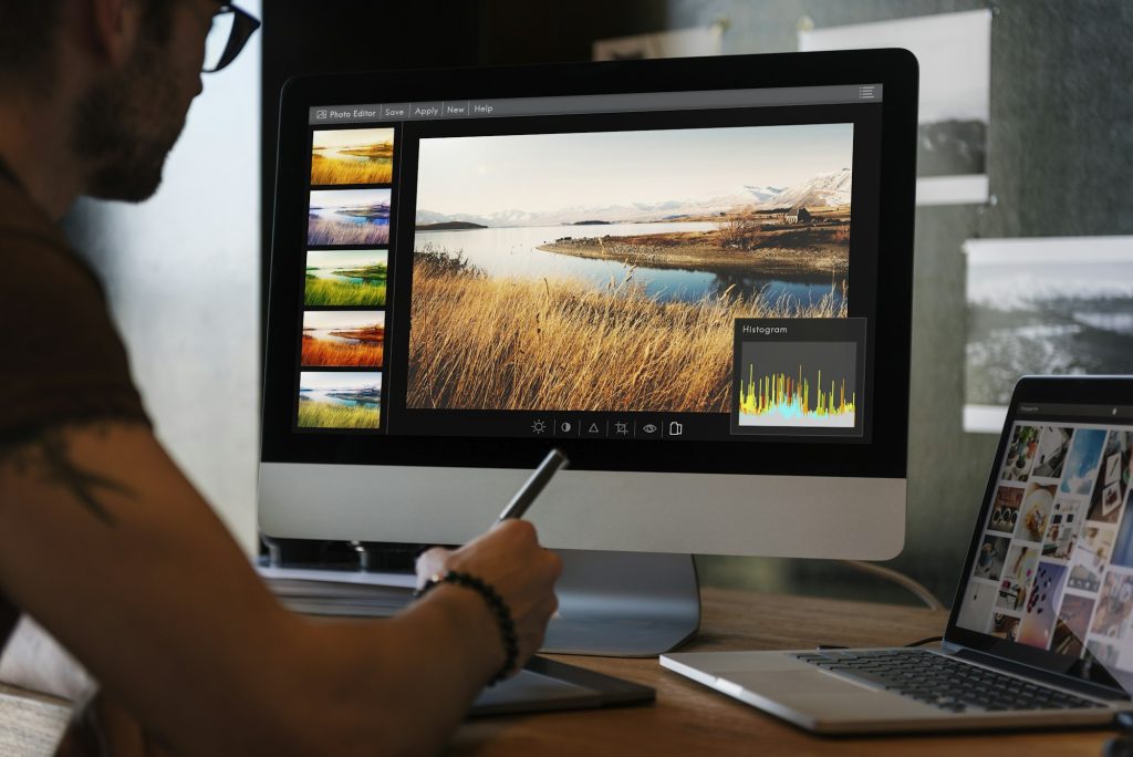 Man editing photos on a computer