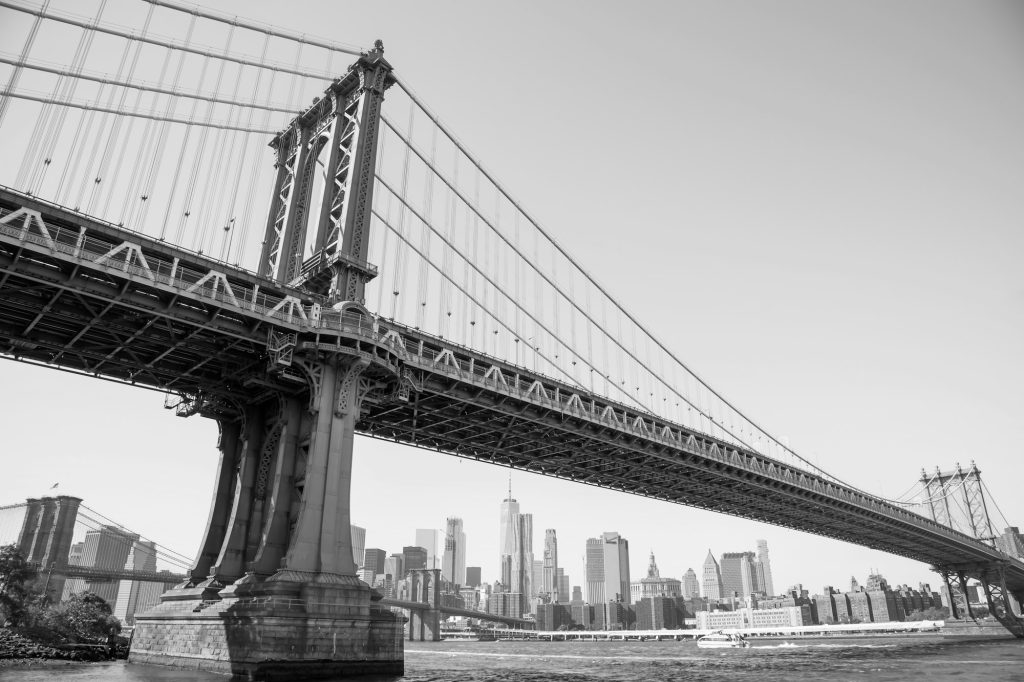 Manhattan bridge over Manhattan skyline black and white