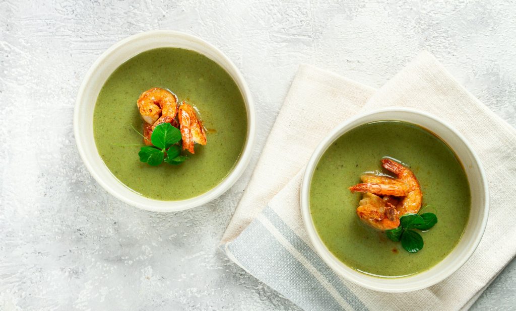 pea cream soup, with shrimp, green soup, homemade, top view, no people,