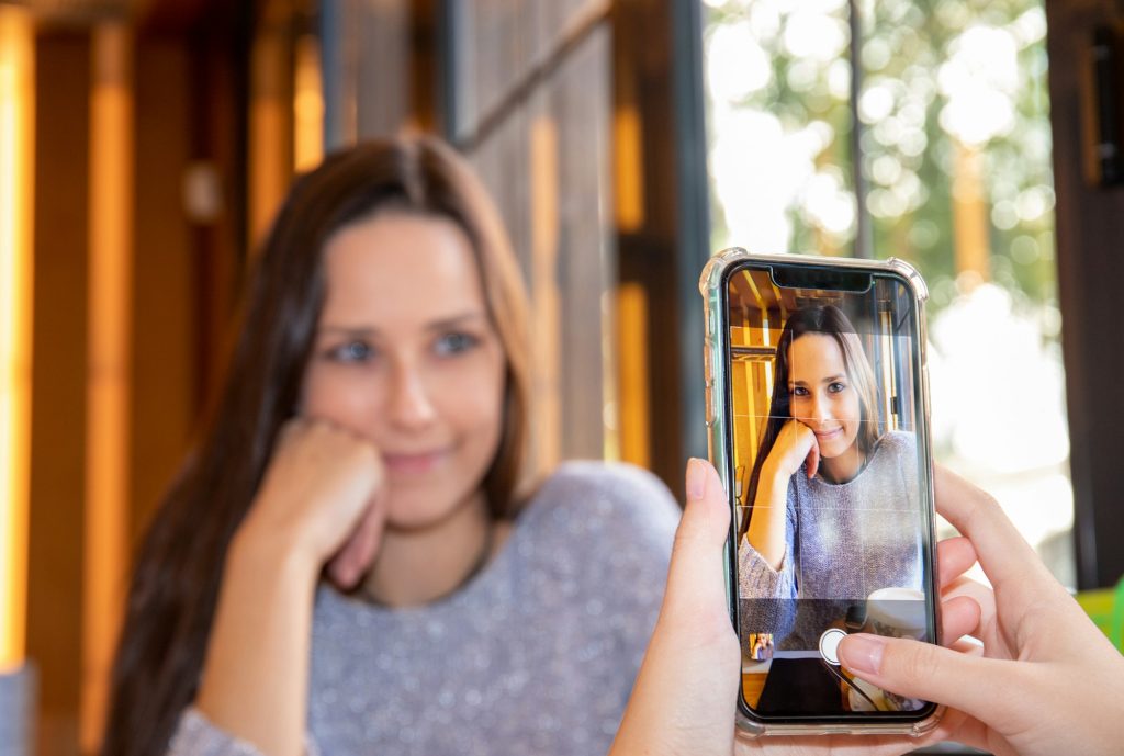 Photograph of another photograph taken with a cell phone in a cafeteria