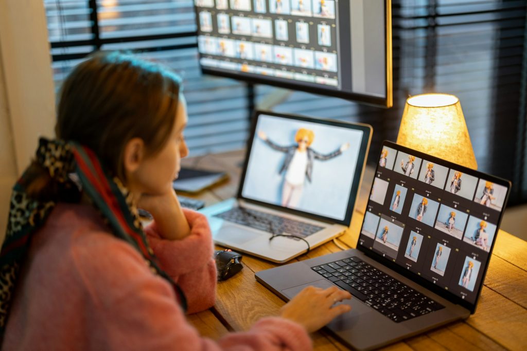 Photographer editing photos at home office