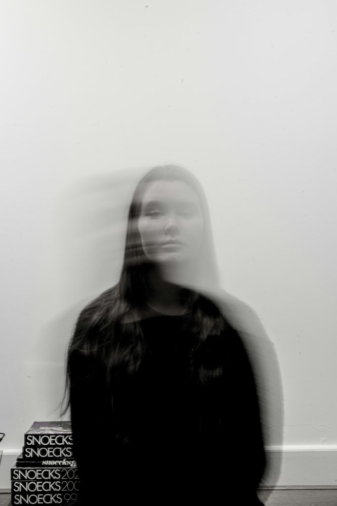 Portrait of a girl with long exposure and movement