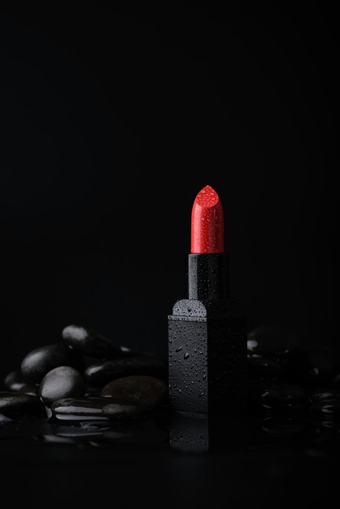 Red lipstick. Makeup cosmetic product photography