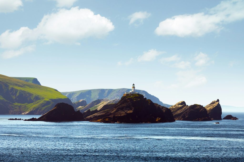 Seascape with lighthouse on the isle Muckle Flugga