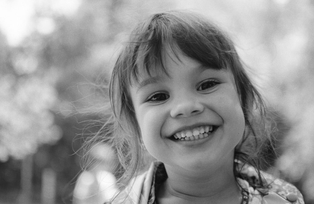 Smile, child portrait, b&w