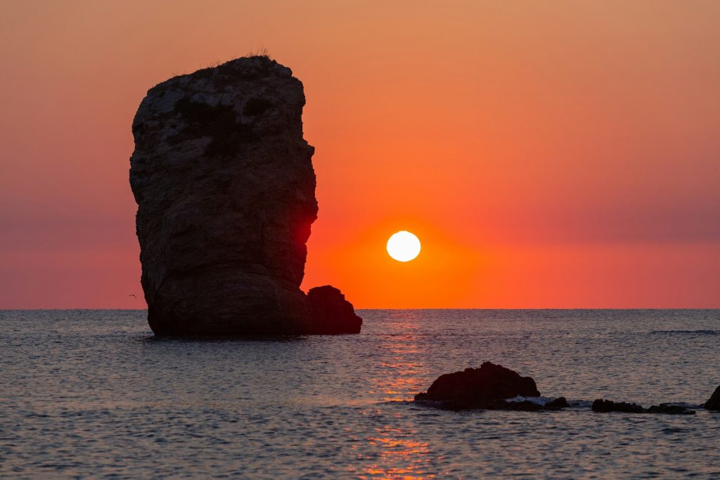 Sun Rises Above The Ocean