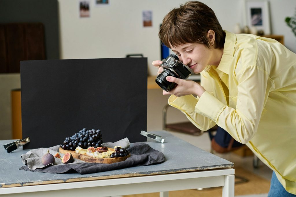 Woman taking pictures with professional camera