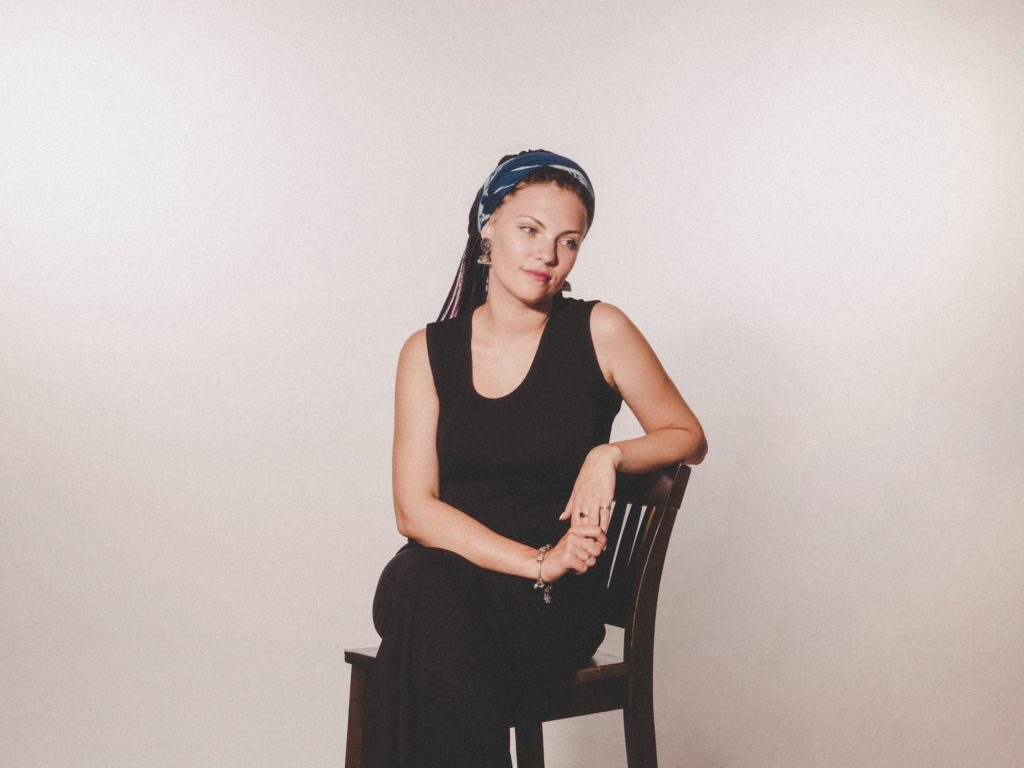 Woman with braids portrait in studio